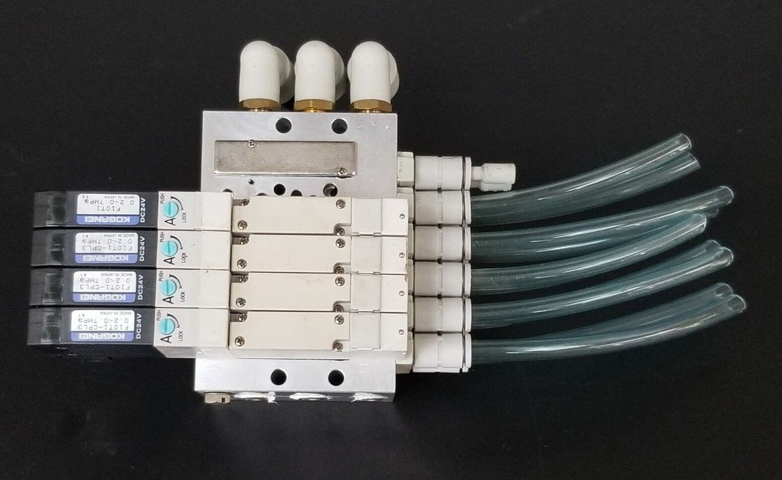 KOGANEI F10M6AJ MANIFOLD W/ FOUR F10T1-CPL3 SOLENOID VALVES, DC24V