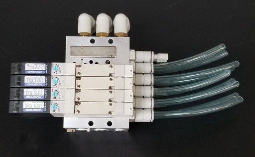 KOGANEI F10M6AJ MANIFOLD W/ FOUR F10T1-CPL3 SOLENOID VALVES, DC24V