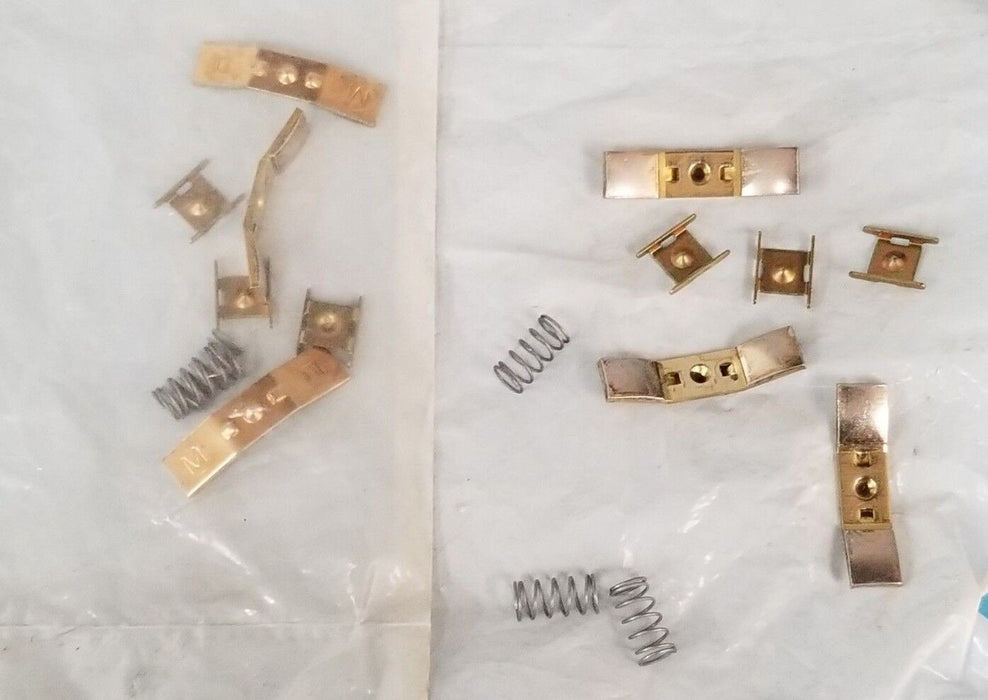 LOT OF 2 NEW SQUARE D CONTACT KITS (UNKNOWN PART NUMBER)