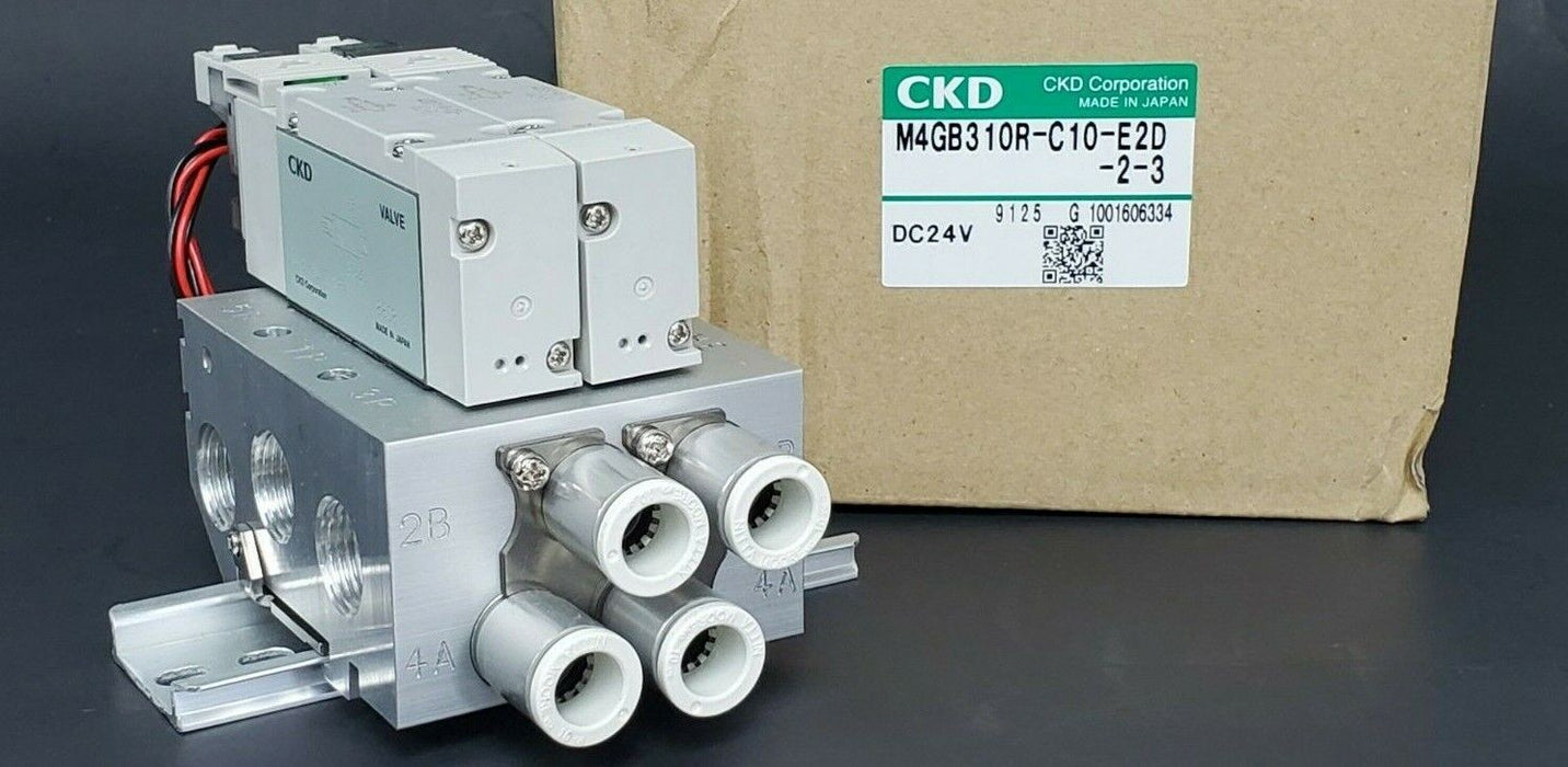 NIB CKD M4GB310R-C10-E2D-2-3 VALVE MANIFOLD ASSEMBLY DC24V M4GB310RC10E2D23
