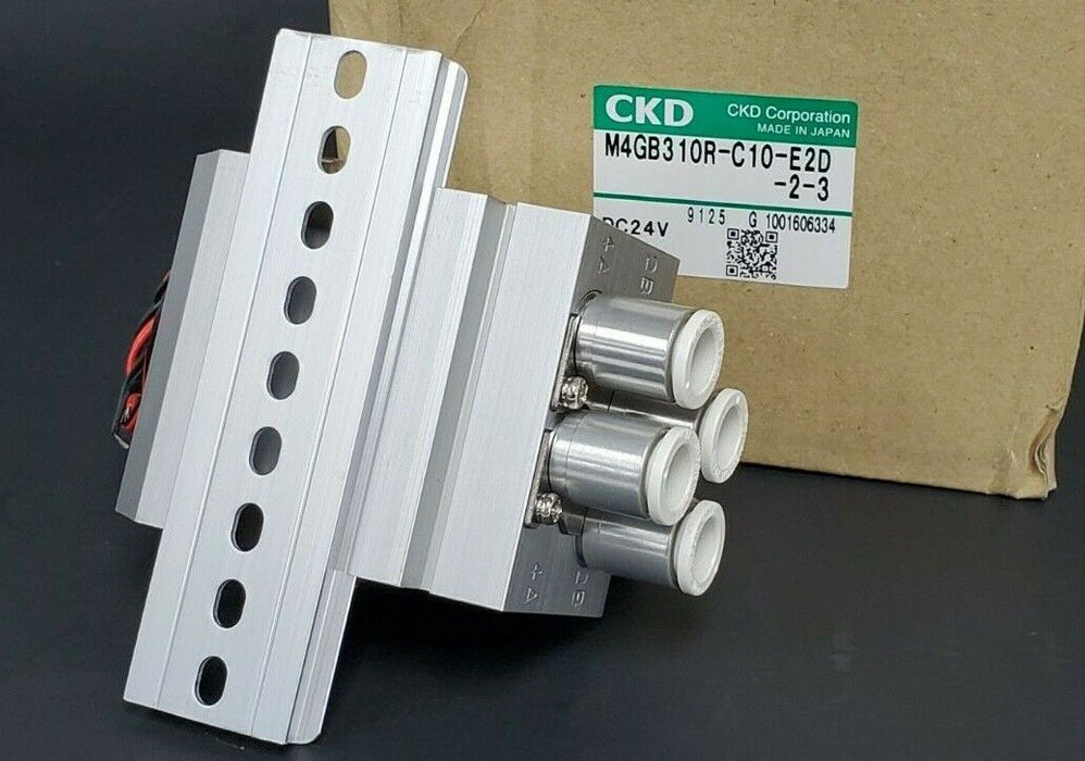 NIB CKD M4GB310R-C10-E2D-2-3 VALVE MANIFOLD ASSEMBLY DC24V M4GB310RC10E2D23