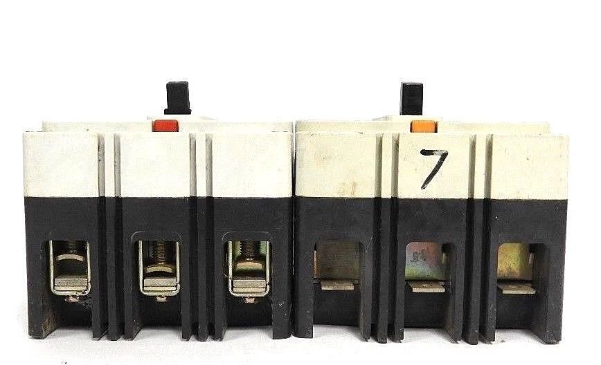 LOT OF 2 WESTINGHOUSE HMCP007C0C CIRCUIT BREAKERS STYLE# 6630C87G05, 7 AMP