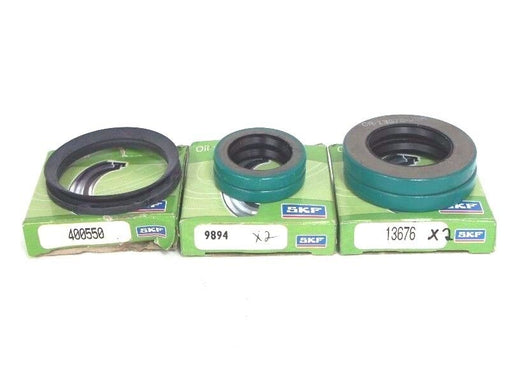 LOT OF 5 NIB SKF OIL SEALS (1) 400550 (2) 9894 (2) 13676