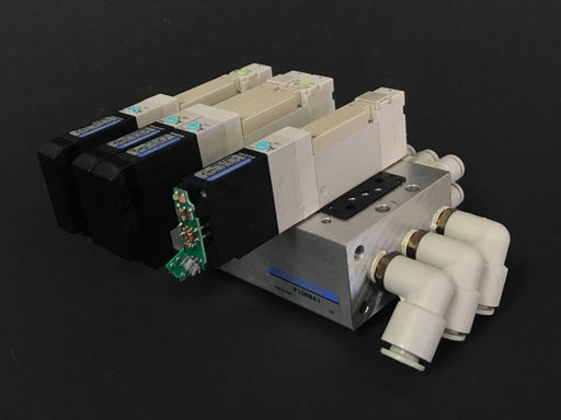 KOGANEI F10M8AJ SOLENOID MANIFOLD BLOCK WITH (4) F10T2-CPL3 VALVES