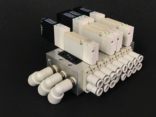 KOGANEI F10M8AJ SOLENOID MANIFOLD BLOCK WITH (4) F10T2-CPL3 VALVES