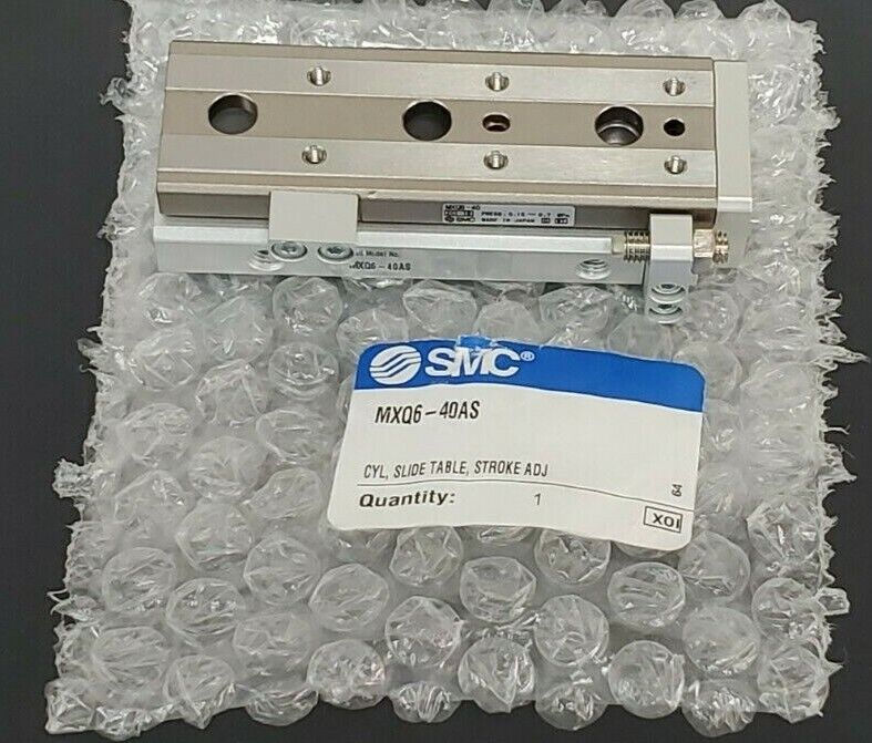 NEW SMC MXQ6-40AS CYL, SLIDE TABLE, STROKE ADJ MXQ640AS