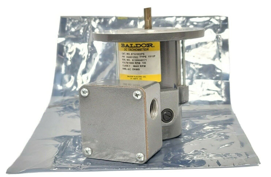 NEW BALDOR X6A001Z002 TACHOMETER CAT: BTG100XPS TYPE: X610P VOLTS/1000 RPM 100
