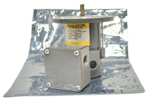 NEW BALDOR X6A001Z002 TACHOMETER CAT: BTG100XPS TYPE: X610P VOLTS/1000 RPM 100